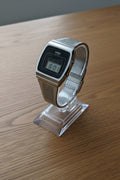 Vintage-style digital watch on a white background