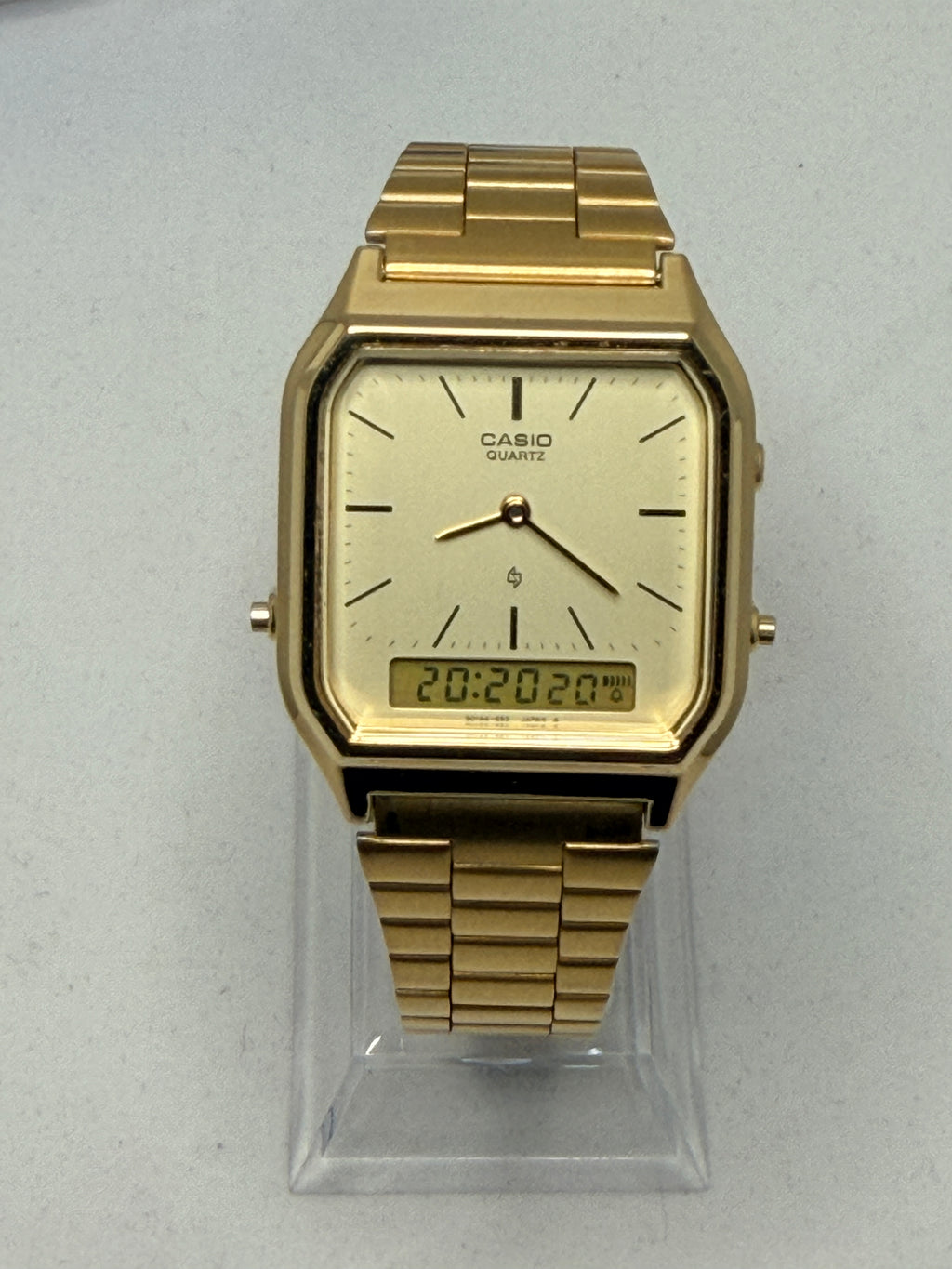 Casio AQ-222 is a vintage, rectangular ana-digi Japan 1980's watch