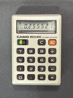 Casio Micro-Mini M-800 is a historic, pocket-sized calculator from 1976 Japan.