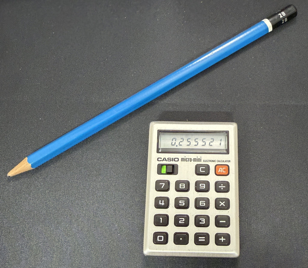 Casio Micro-Mini M-800 is a historic, pocket-sized calculator from 1976 Japan.