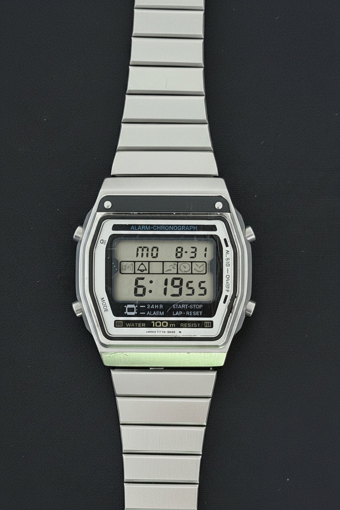 Seiko Alba Y770-5050 is a vintage 1980s digital LCD chronograph watch Japan