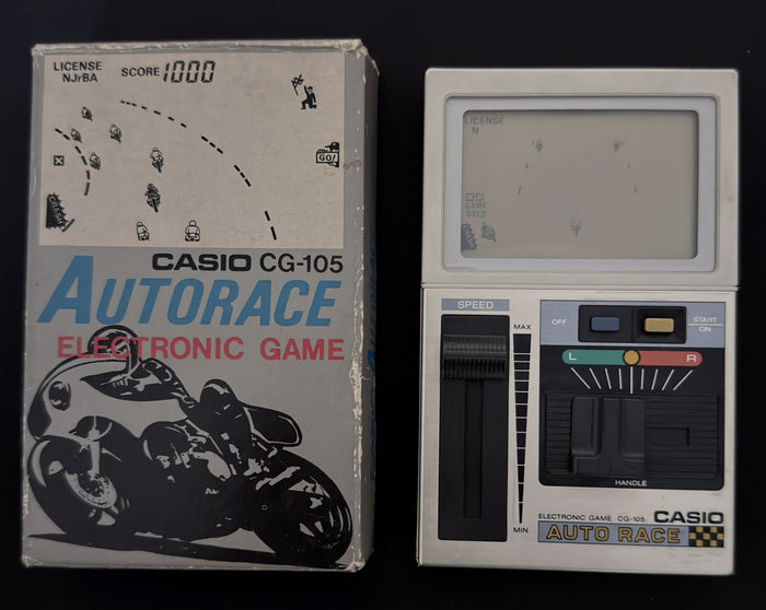 Casio CG-105 handheld LCD game "Auto Race" "Le Bol D'or Moto") Japan 1982