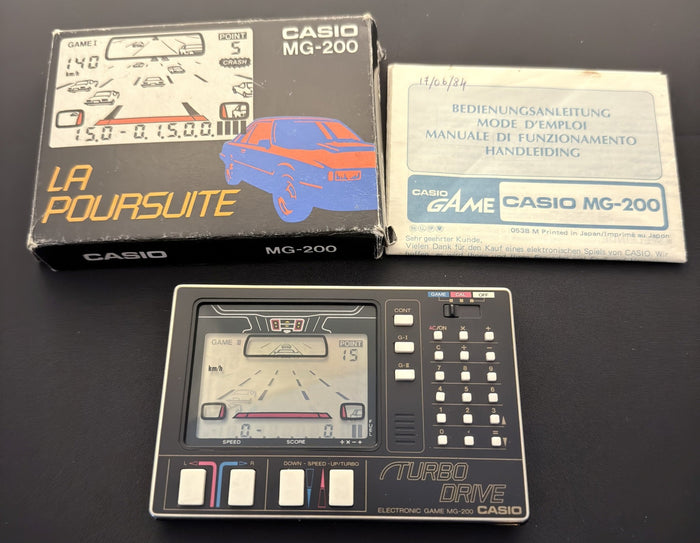 Casio MG-200 Turbo Drive super rare game calculator Japan 1983